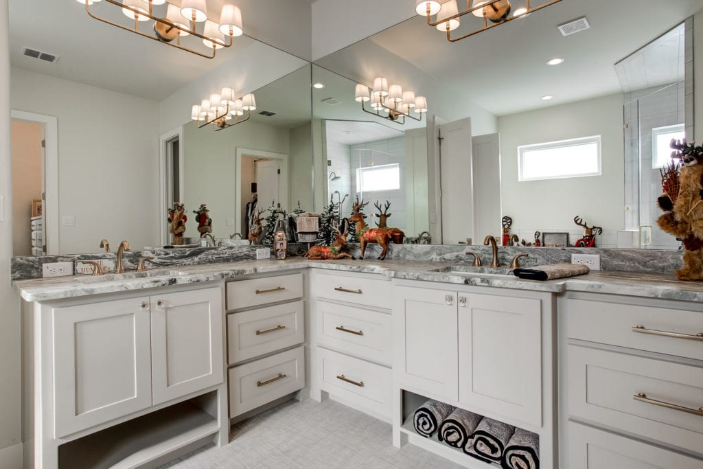 A large bathroom vanity with small holiday decorations