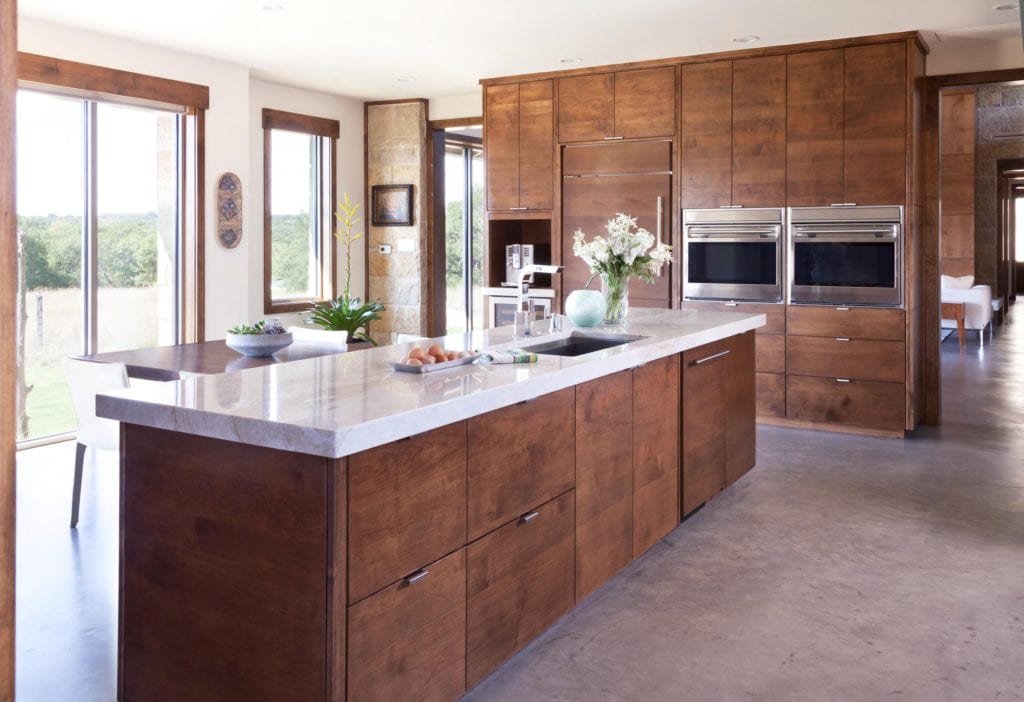 An island kitchen countertop with a sink